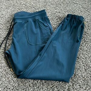 NWOT Zyia Dark Teal Peak Zipper Joggers